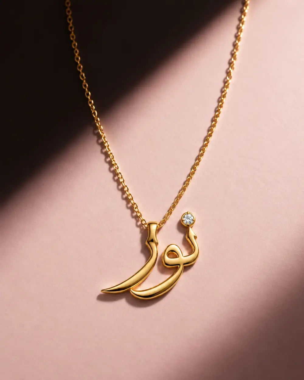 A closer look at the Noor Necklace on blush pink